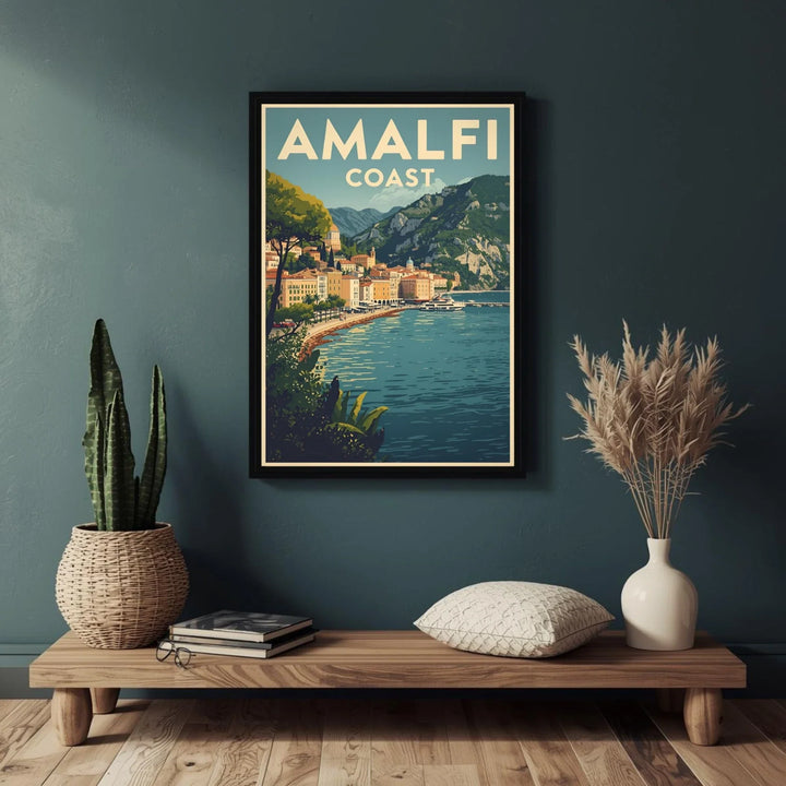 Framed Amalfi Coast poster on a wall above a wooden console table with decorative items.