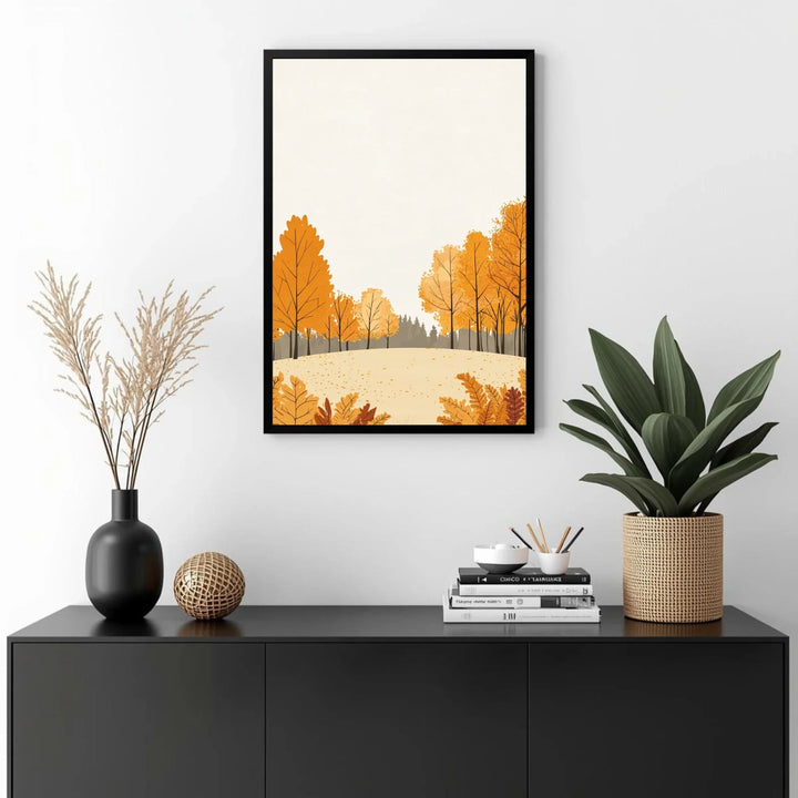 Framed artwork of autumn trees on a wall above a black console table with decorative items.