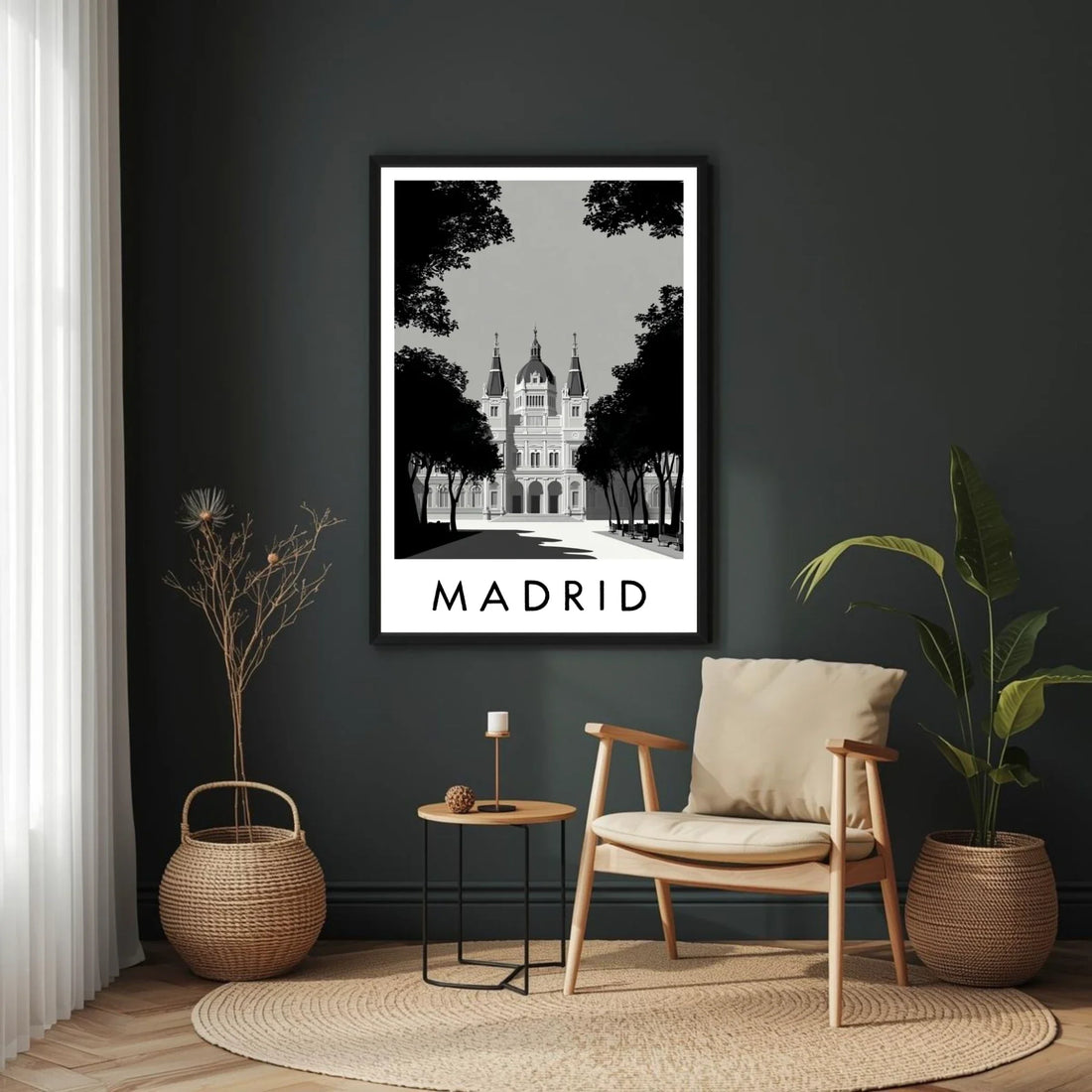 Framed artwork of Madrid on a dark wall above a wooden chair with a plant and small table.