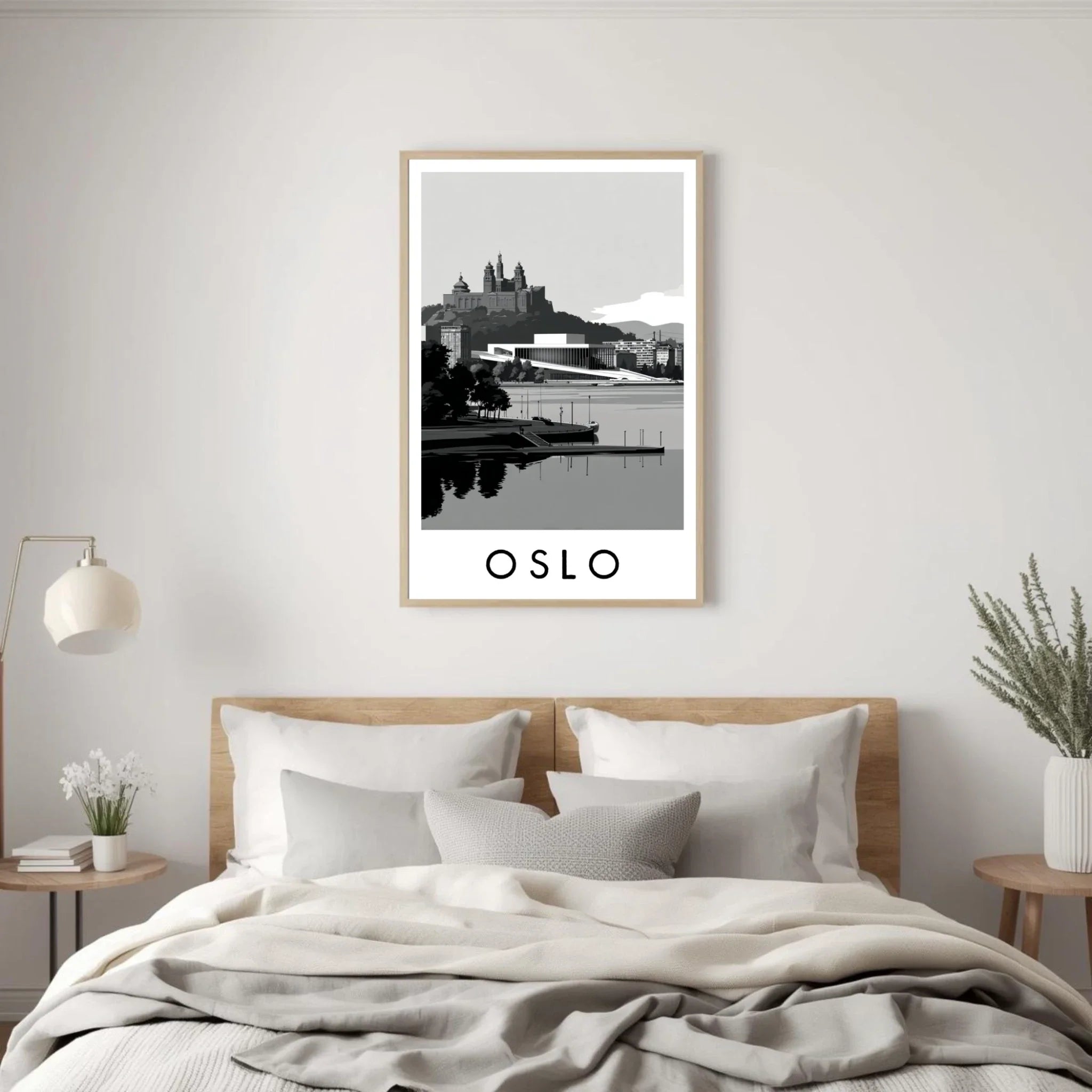 Framed artwork of Oslo on a wall above a bed in a bedroom.