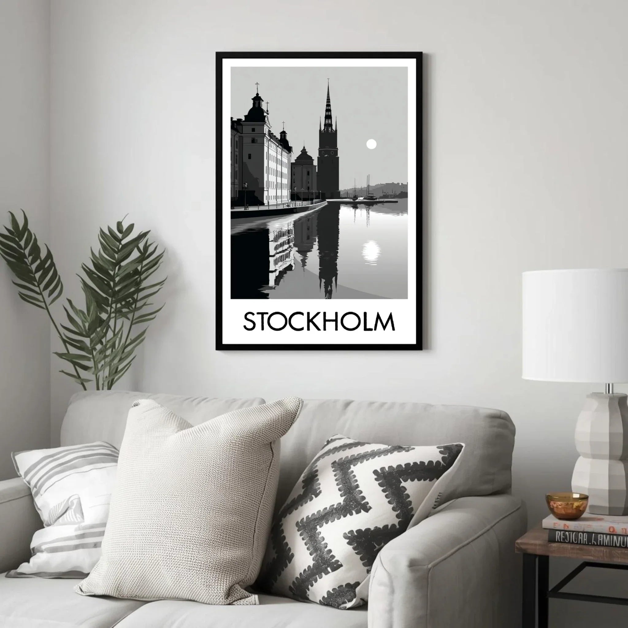 Framed artwork of Stockholm with a sofa and decorative items in the foreground