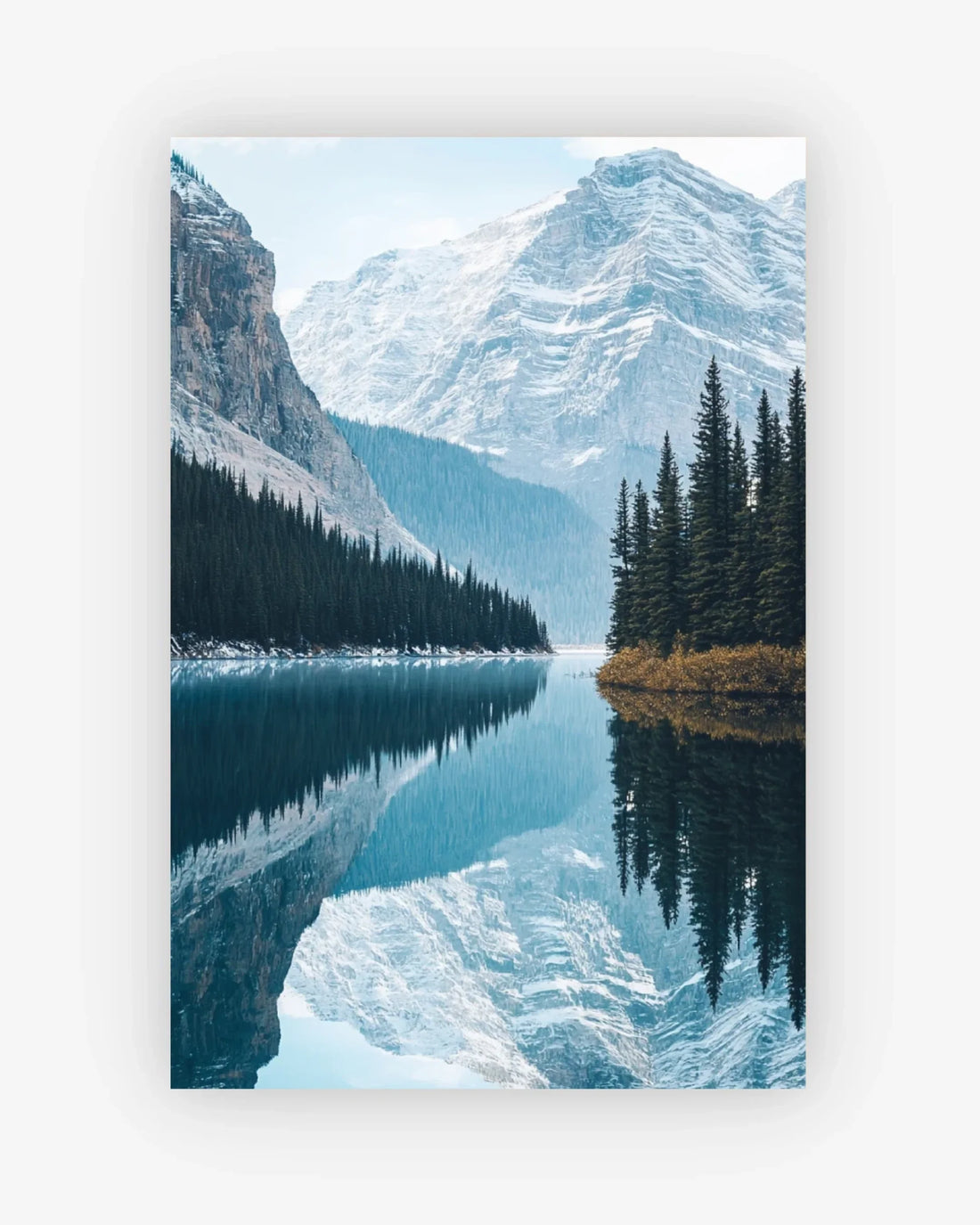 Lake with snow-capped mountains and evergreen trees on a white background