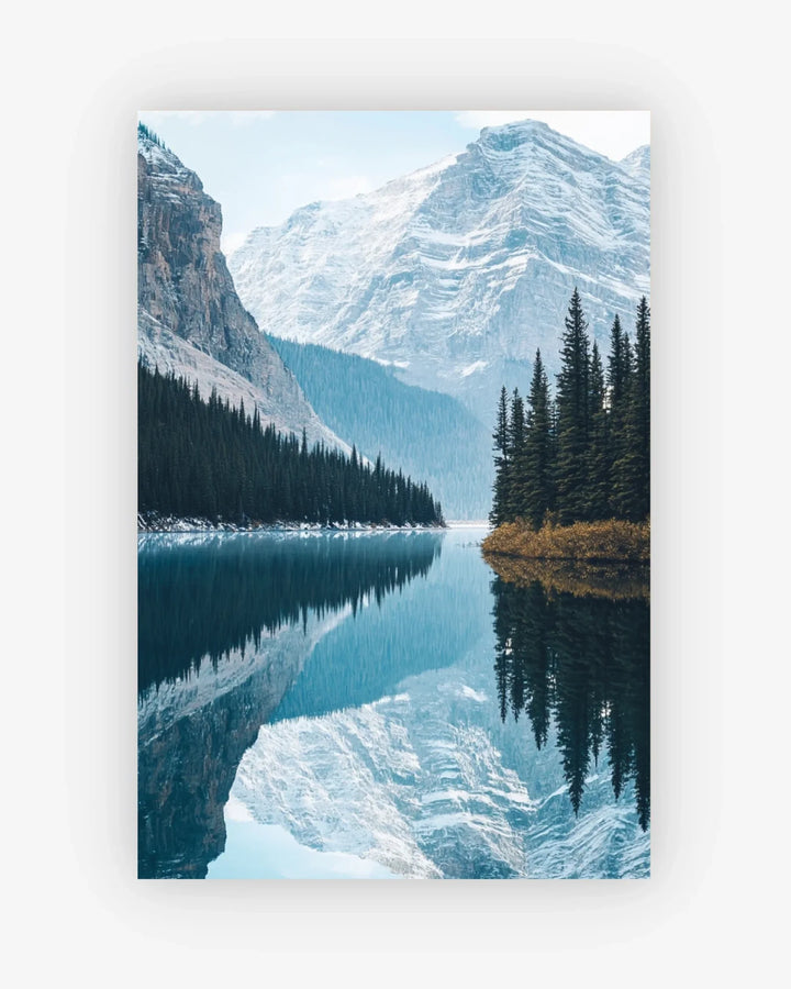Lake with snow-capped mountains and evergreen trees on a white background