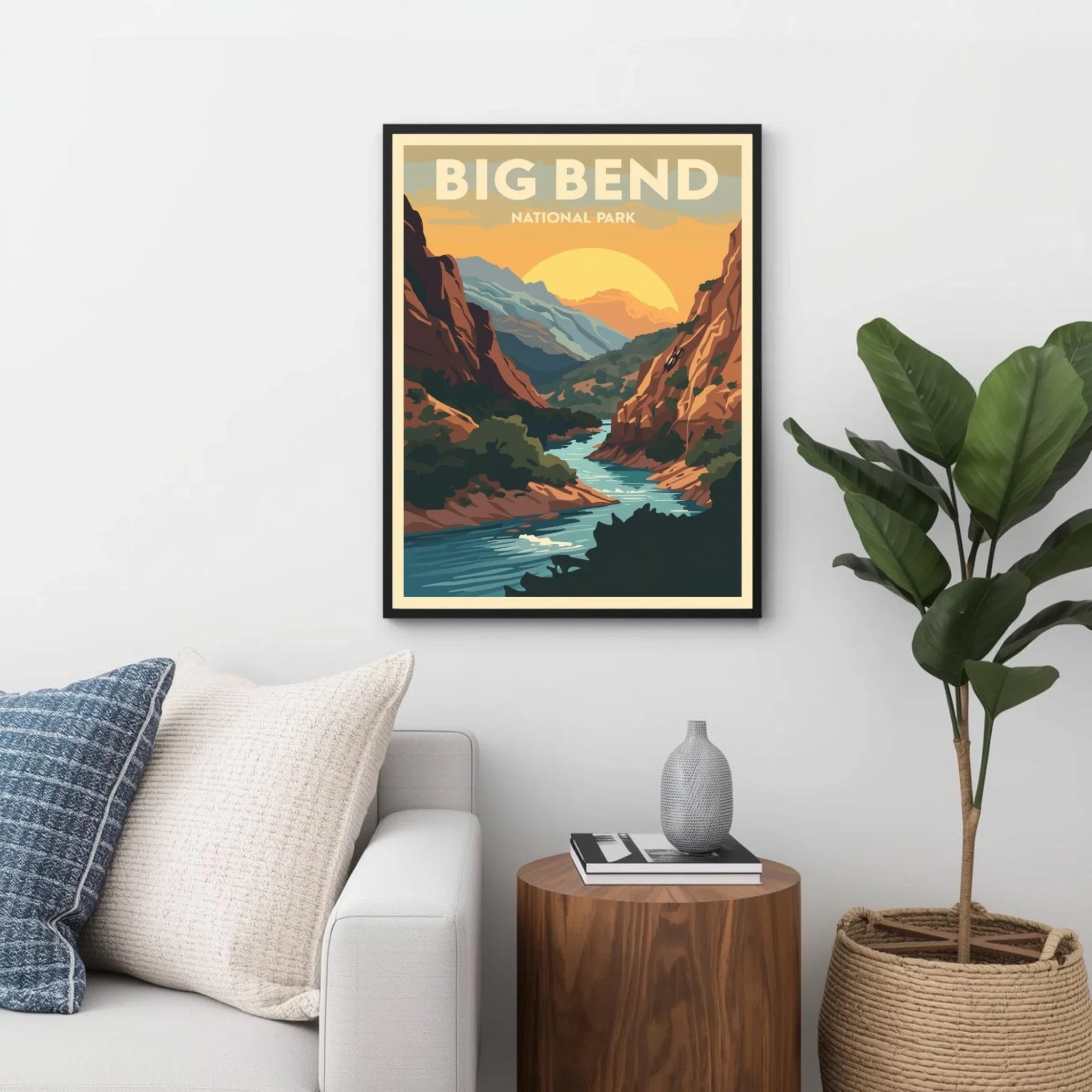 Framed poster of Big Bend National Park in a living room setting with a couch, plant, and side table.