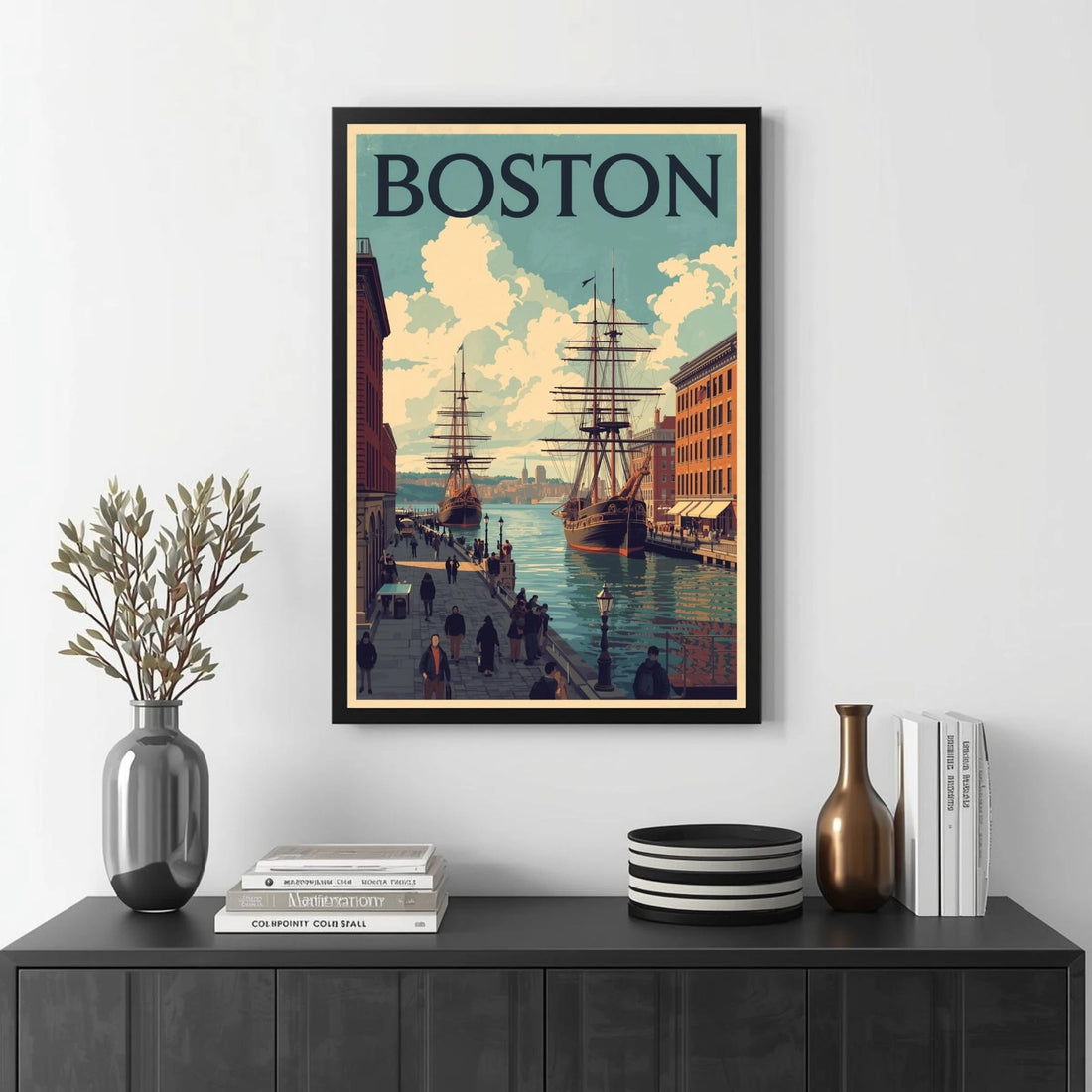 Framed Boston poster on a wall above a black console table with decorative items.