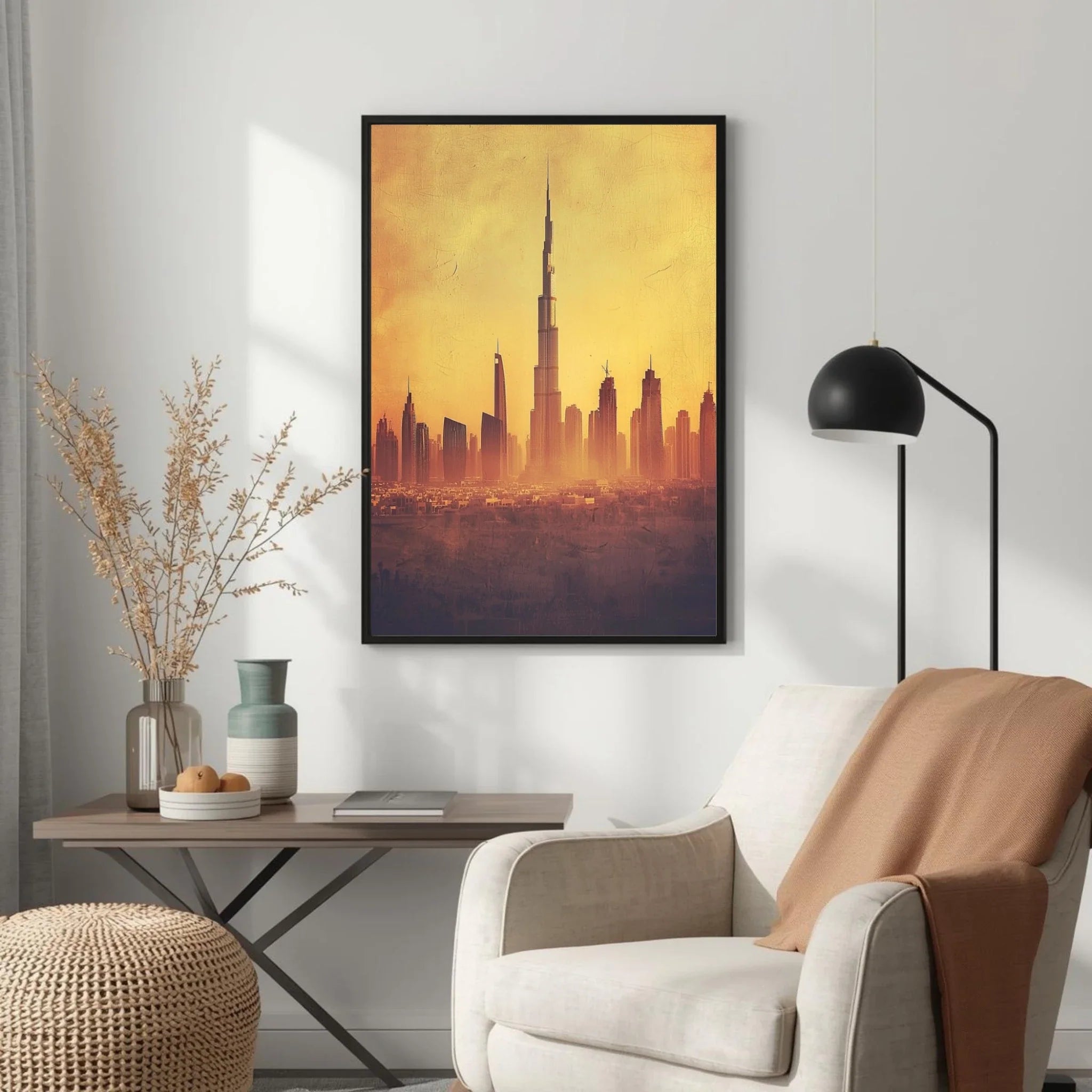 Living room with a cityscape painting on the wall, armchair, and side table.