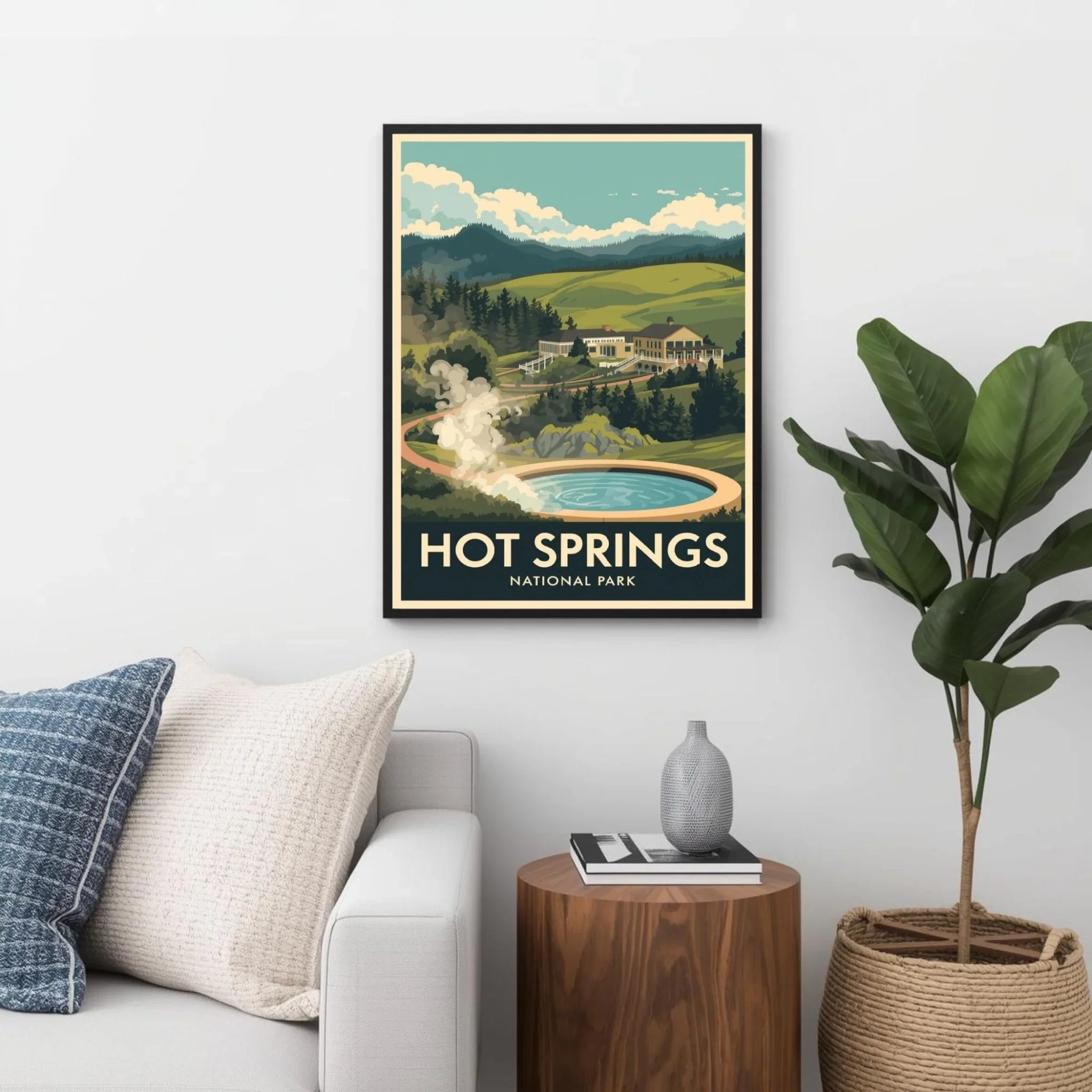Framed poster of Hot Springs National Park on a wall above a sofa.