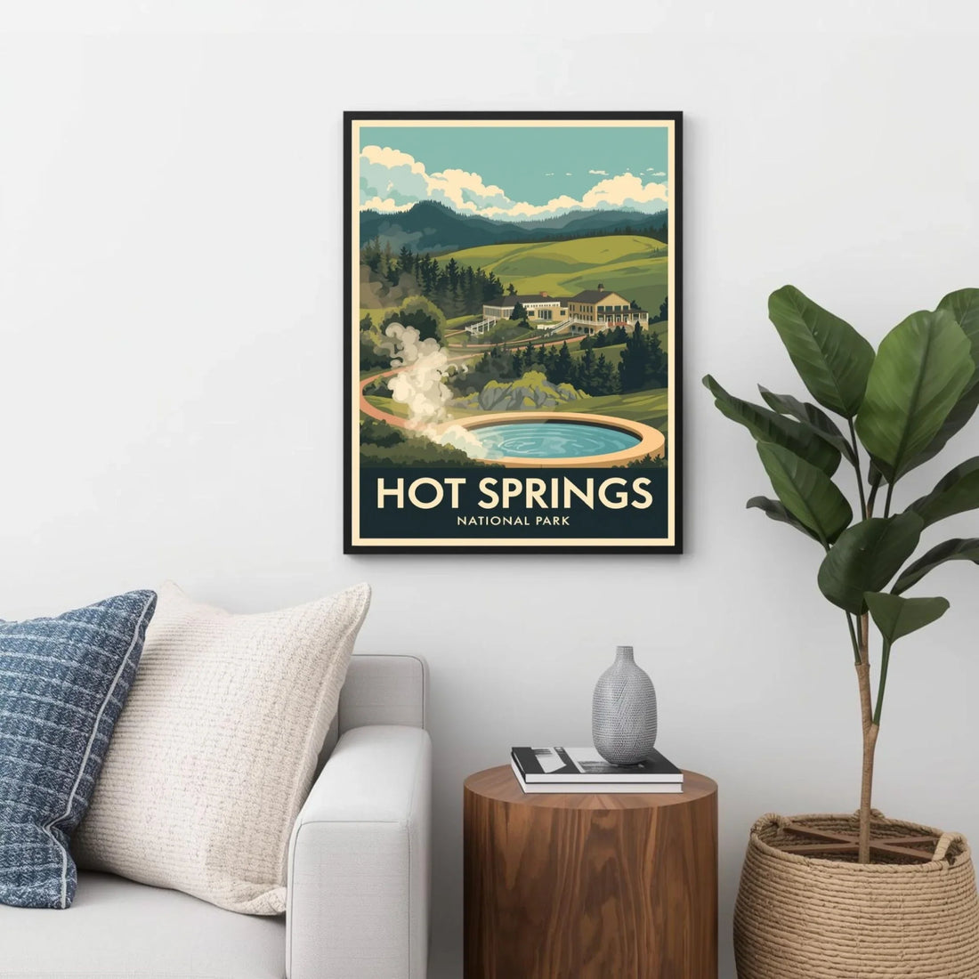 Framed poster of Hot Springs National Park on a wall above a sofa.