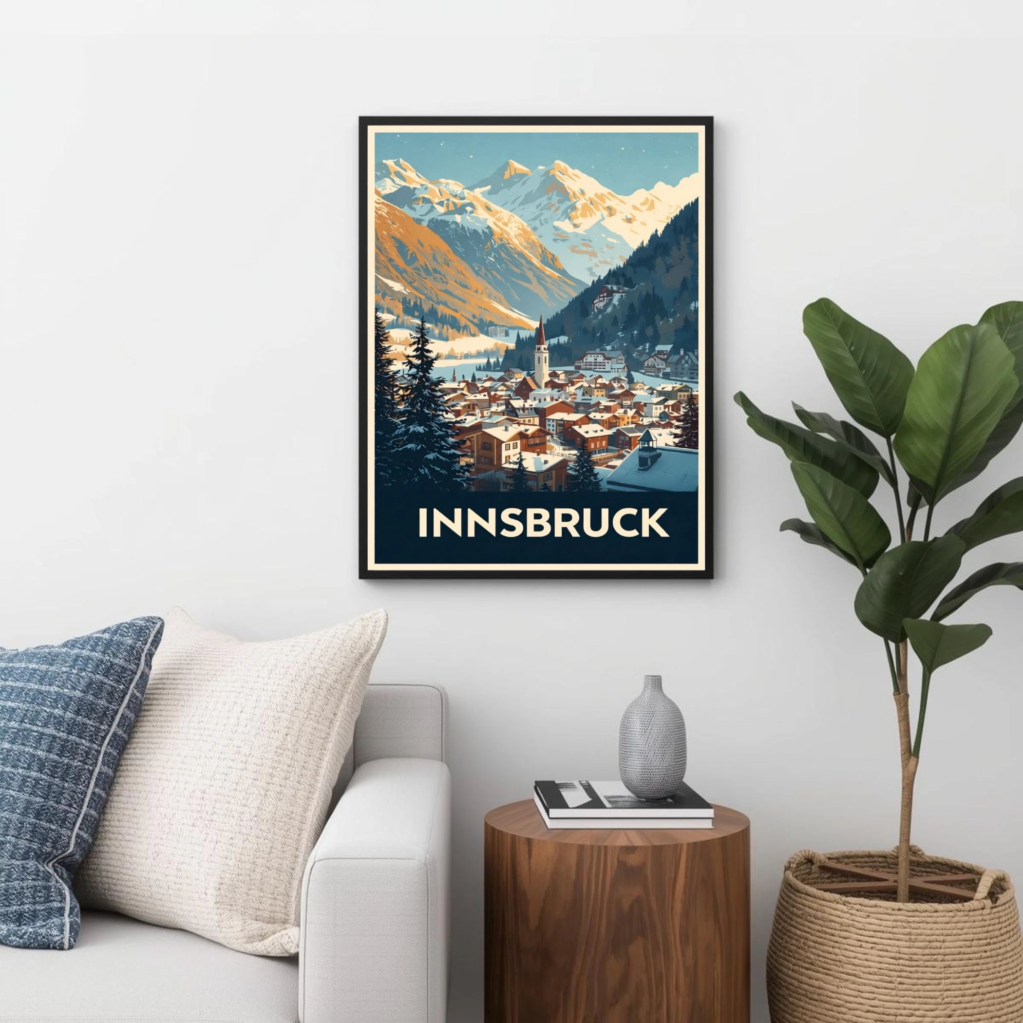 Framed poster of Innsbruck with a mountain view in a living room setting.
