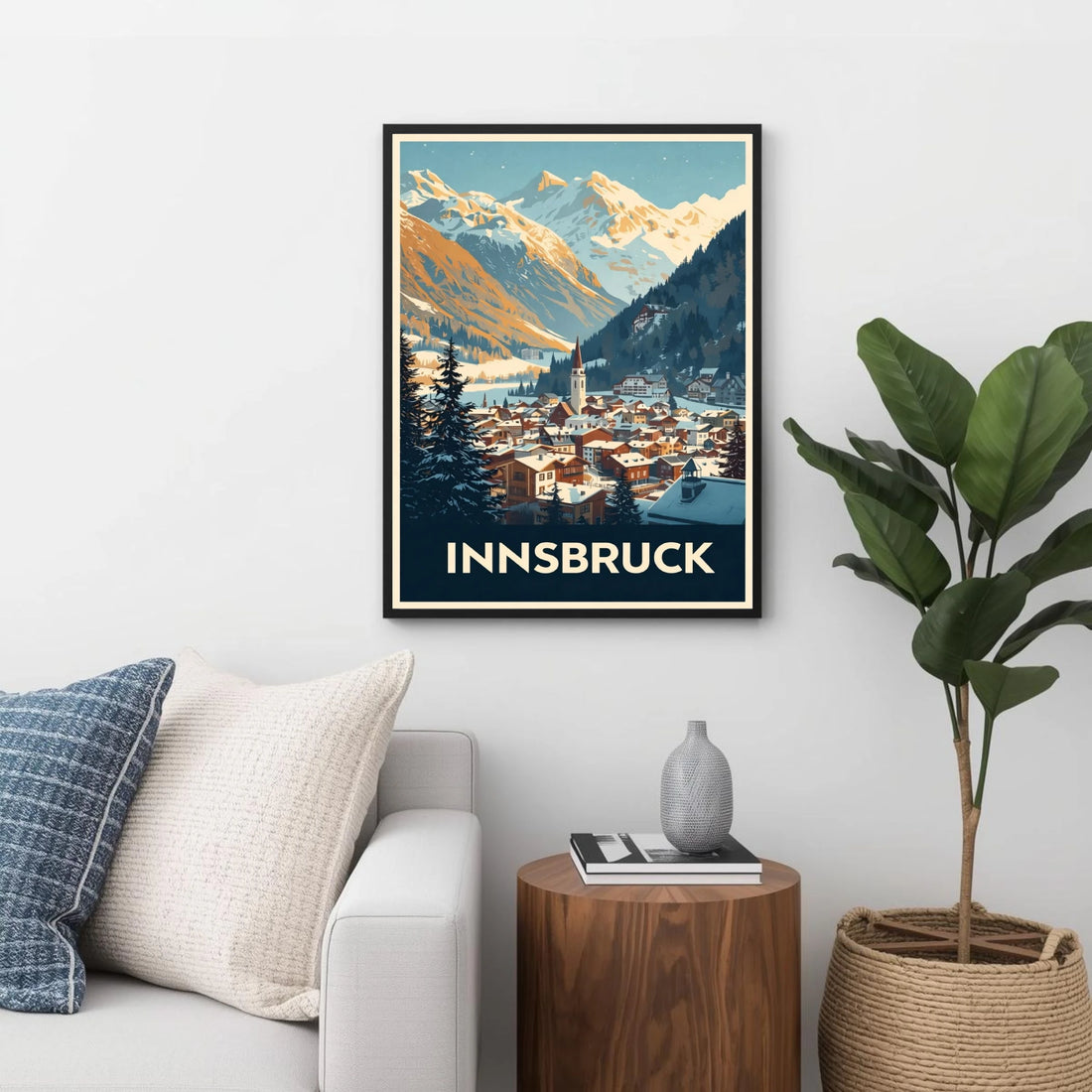 Framed poster of Innsbruck with a mountain view in a living room setting.
