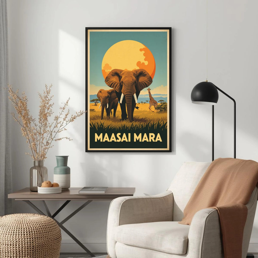 Framed poster of elephants and a giraffe with 'Maasai Mara' text in a living room setting.