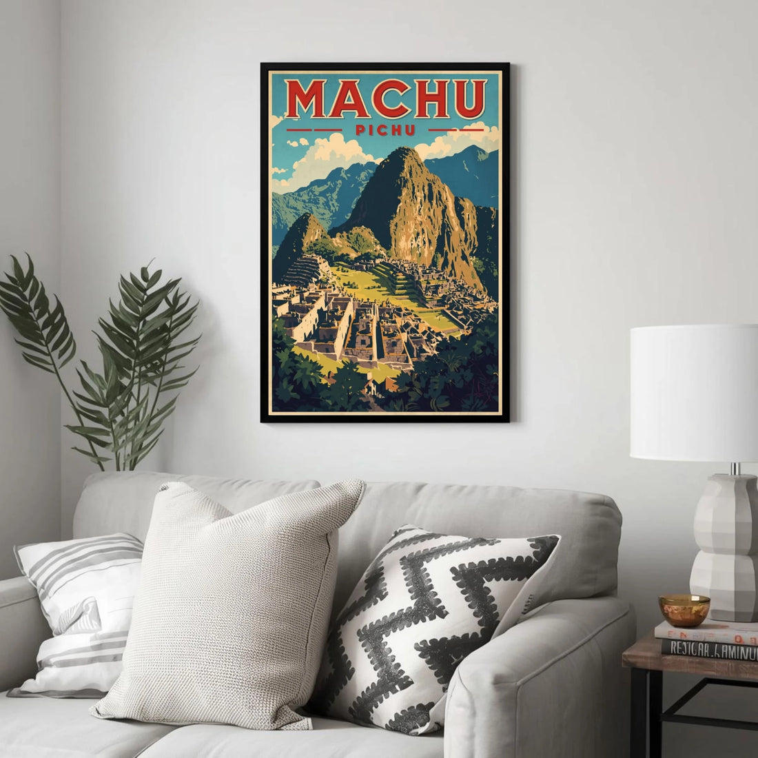 Framed poster of Machu Picchu above a sofa in a living room.