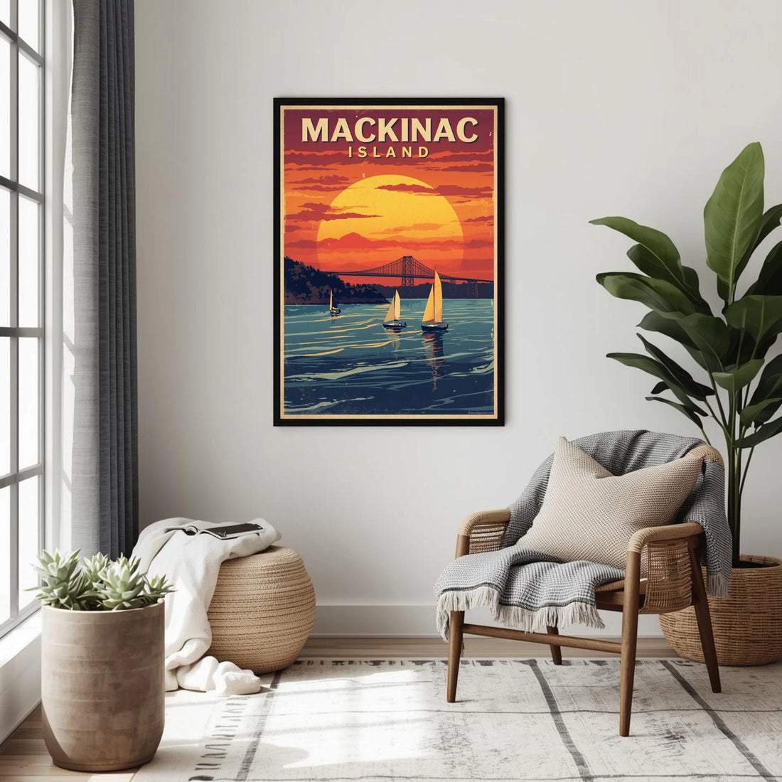 Living room with a framed poster of Mackinac Island, Michigan, featuring a sunset over water.