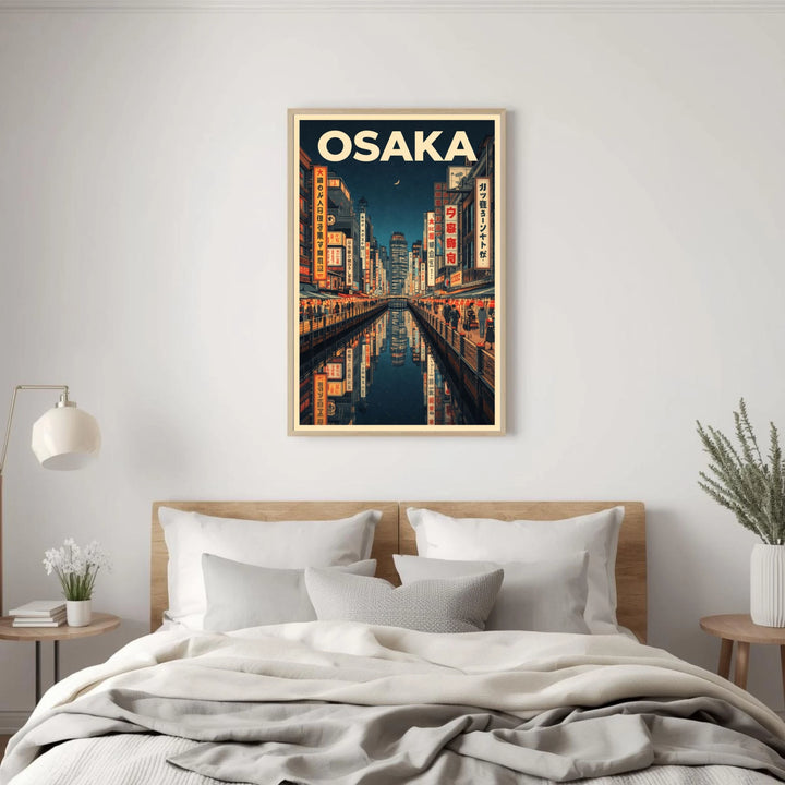 Framed artwork of Osaka cityscape above a bed in a bedroom.