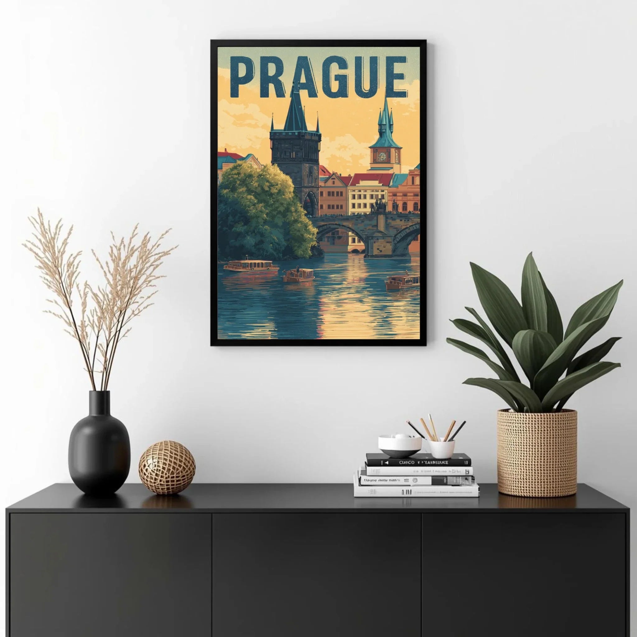 Framed poster of Prague with decorative items on a black cabinet.
