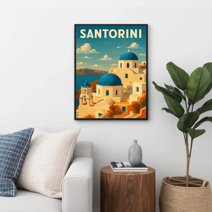 Framed Santorini artwork on a wall above a sofa with decorative items.
