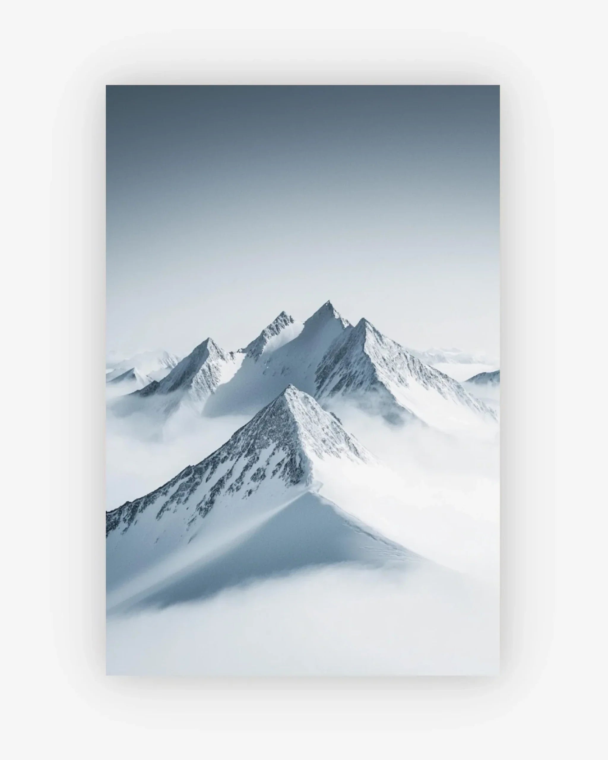 Snowy mountain peaks under a clear blue sky