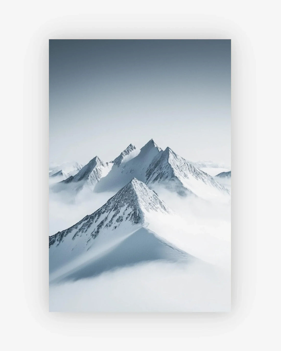 Snowy mountain peaks under a clear blue sky