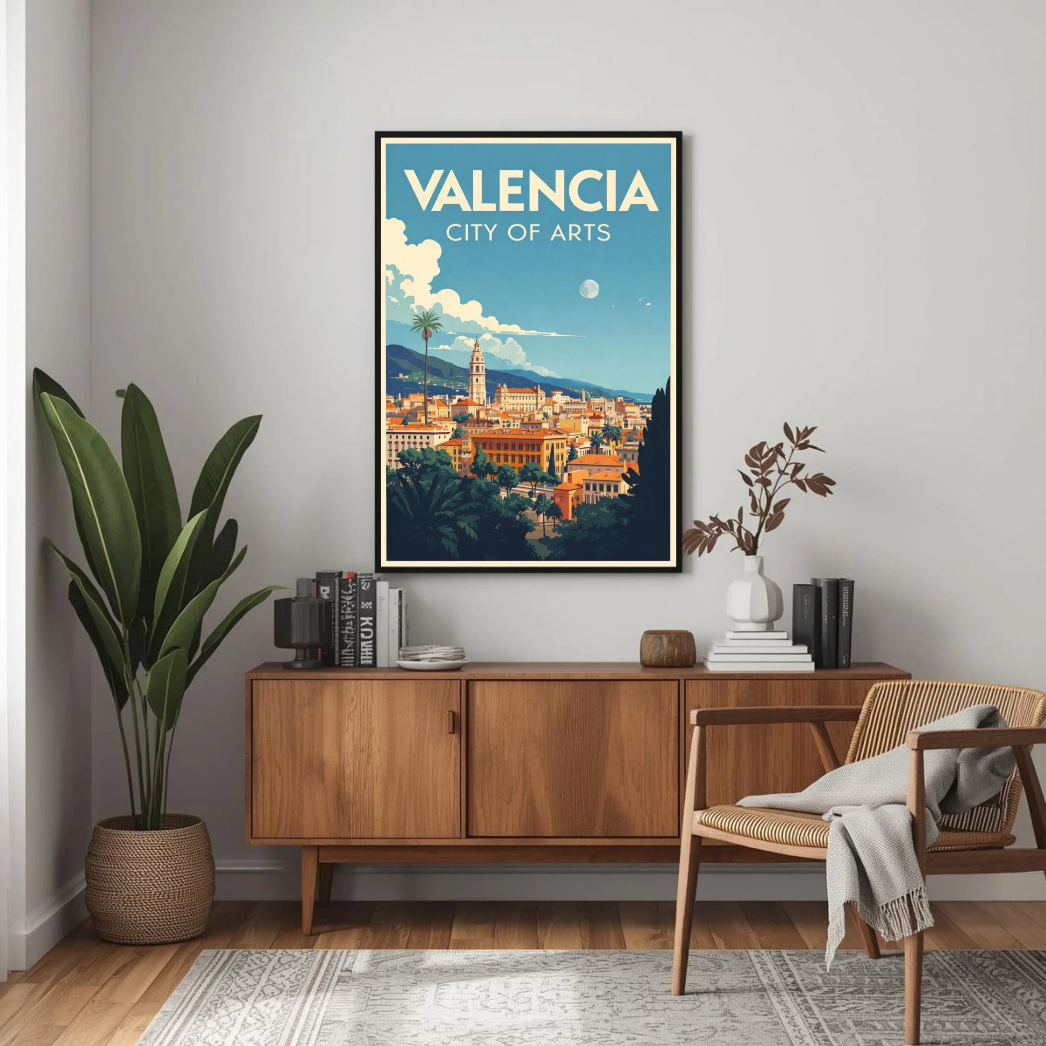 Living room with a 'Valencia City of Arts' poster on the wall, wooden sideboard, and chair.
