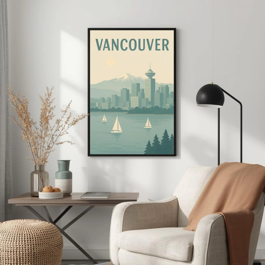 Framed poster of Vancouver with sailboats on a cityscape, displayed in a living room.