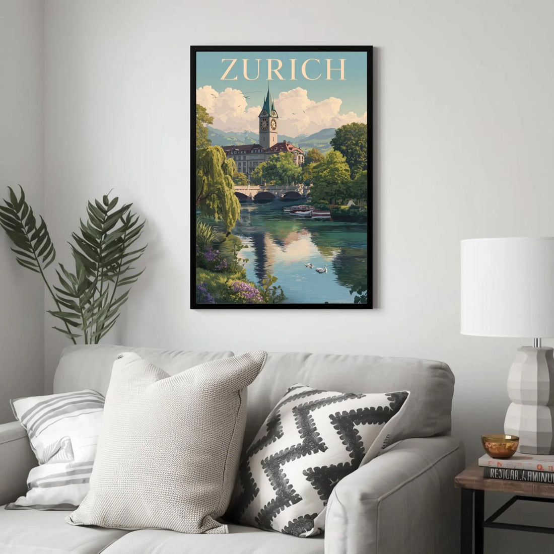 Framed artwork of Zurich with a cityscape and lake on a gray wall above a sofa.