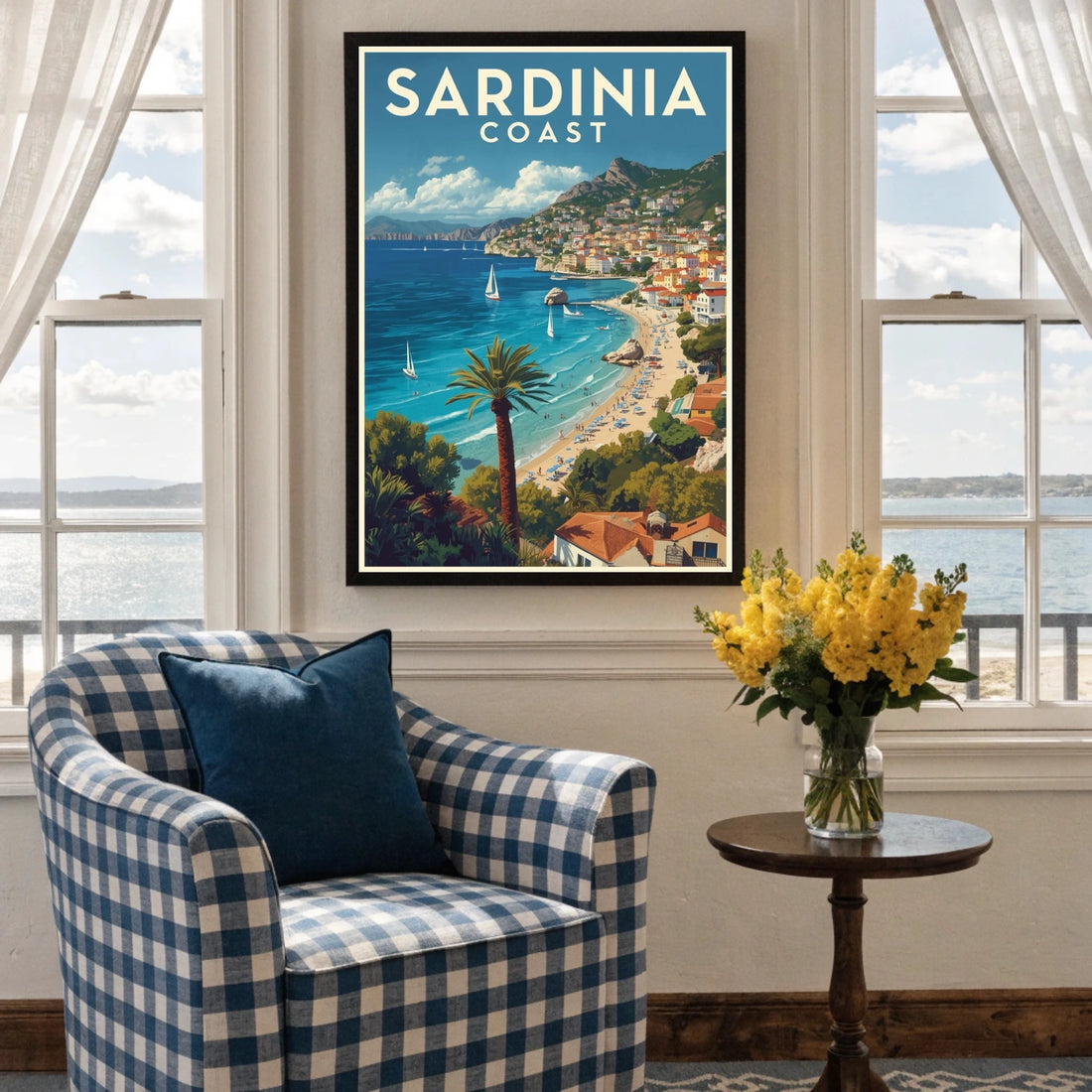 Framed artwork of Sardinia Coast in a room with a checkered armchair and window view.